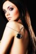brunette girl posing on dark background