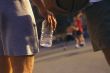 Man Holding Bottled Water