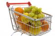 Shopping trolley with fruits, supermarket