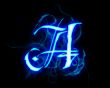 Blue flame magic font over black background. Letter A