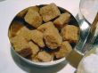 Bowl of brown and cane sugar cubes