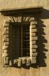 Volterra (Pisa) - Window of ancient palace with shadows