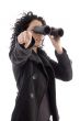 pointing female holding binocular