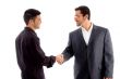 businesspeople communicating and shaking hand