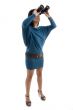 side view of woman looking through binocular