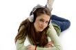 beautiful young female enjoying music