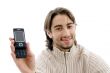 handsome man showing cell phone