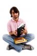 student closing his notebook