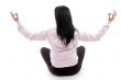 back pose of female in lotus pose