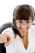 cheerful customer care executive pointing