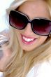 close up of smiling woman looking at camera