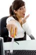 front view of businesswoman holding measuring tape