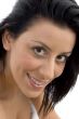 close up of smiling model looking at camera