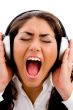 young woman listening to music and singing also