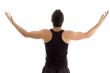 back pose of man with raised arms