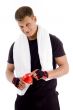 muscular male opening the cap of water bottle