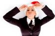 young executive wearing christmas hat