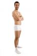 standing shirtless male with folded hands