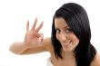 portrait of adult woman showing ok sign