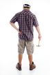 back pose of worker holding hammer