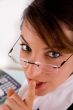 side view of shushing businesswoman