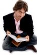 handsome sitting male with books