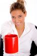 top view of smiling woman offering coffee