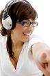 front view of smiling businesswoman pointing