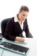 blond professional writing on notebook