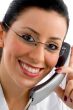 pleased female doctor holding receiver