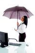 young professional holding umbrella