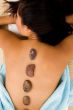 pretty woman getting hot stone massage