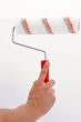 hand holding painting roller