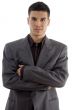 young executive standing with crossed arms