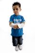 little boy with arms folded