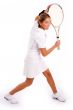 side view of young woman playing tennis