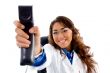 smiling doctor showing phone receiver