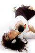 businesswoman lying down holding a microphone