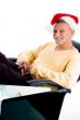 smiling male wearing christmas hat