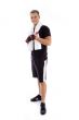 standing adult male holding towel