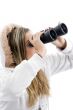 professional photographer eyeing with binoculars