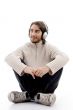handsome male listening to music with headphones