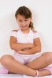 smiling girl with crossed arms