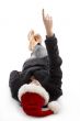 pointing female wearing christmas hat