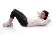 side pose of laying exercising female
