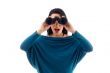 female looking through binocular