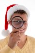 smiling male looking through lens