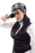 female posing with cap