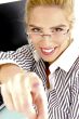 front view of smiling woman pointing