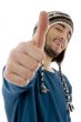 side pose of young male with thumbs up